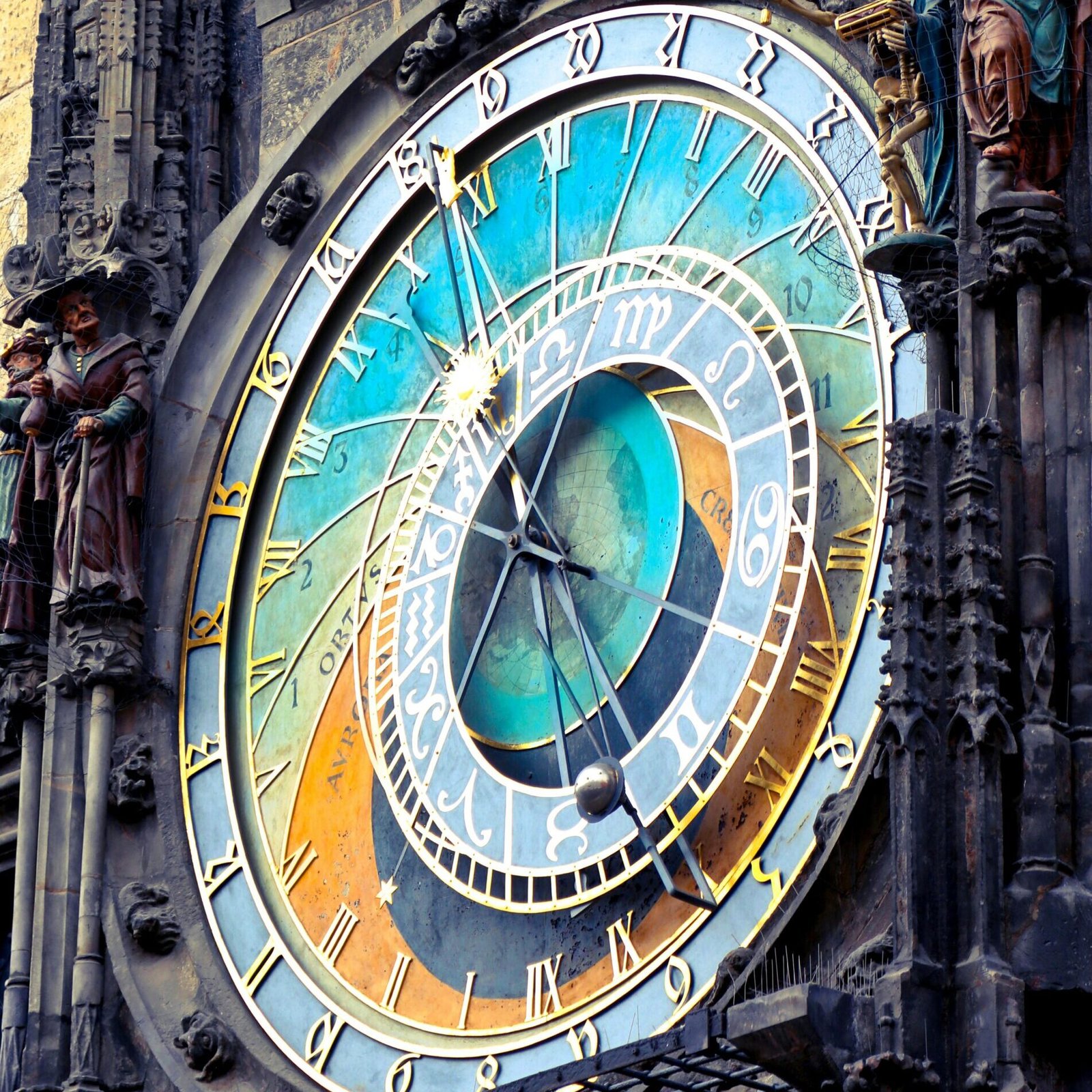 Close-up of Prague's historic astronomical clock featuring intricate details and vibrant colors.